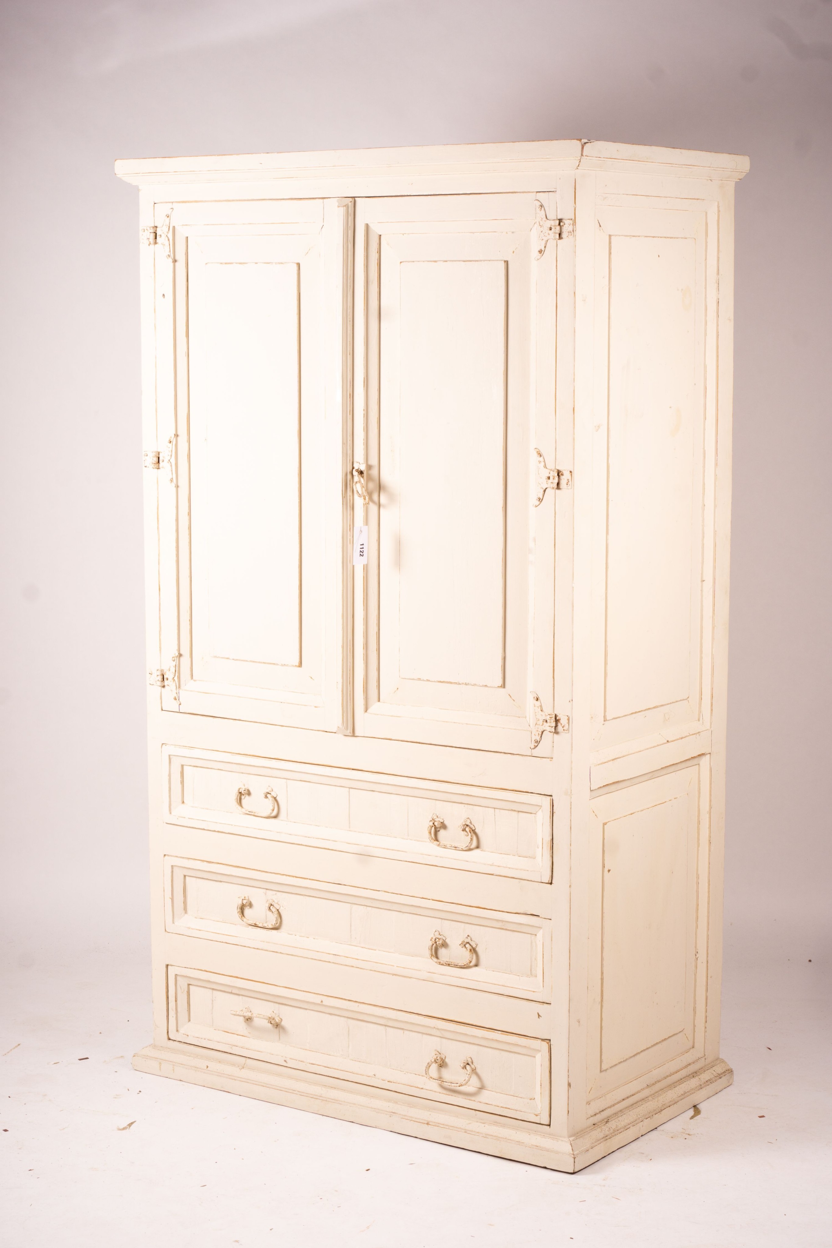 A 19th century Continental painted pine press cupboard, length 105cm, depth 62cm, height 182cm